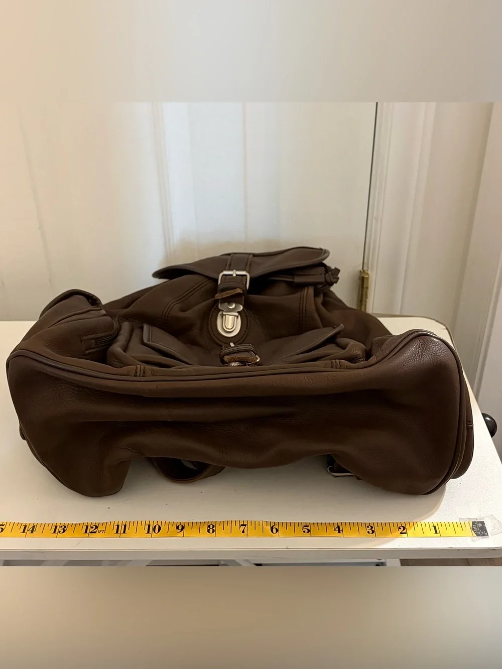 Unisex Dark Brown Leather Backpack with Front and Side Buckle Pocket